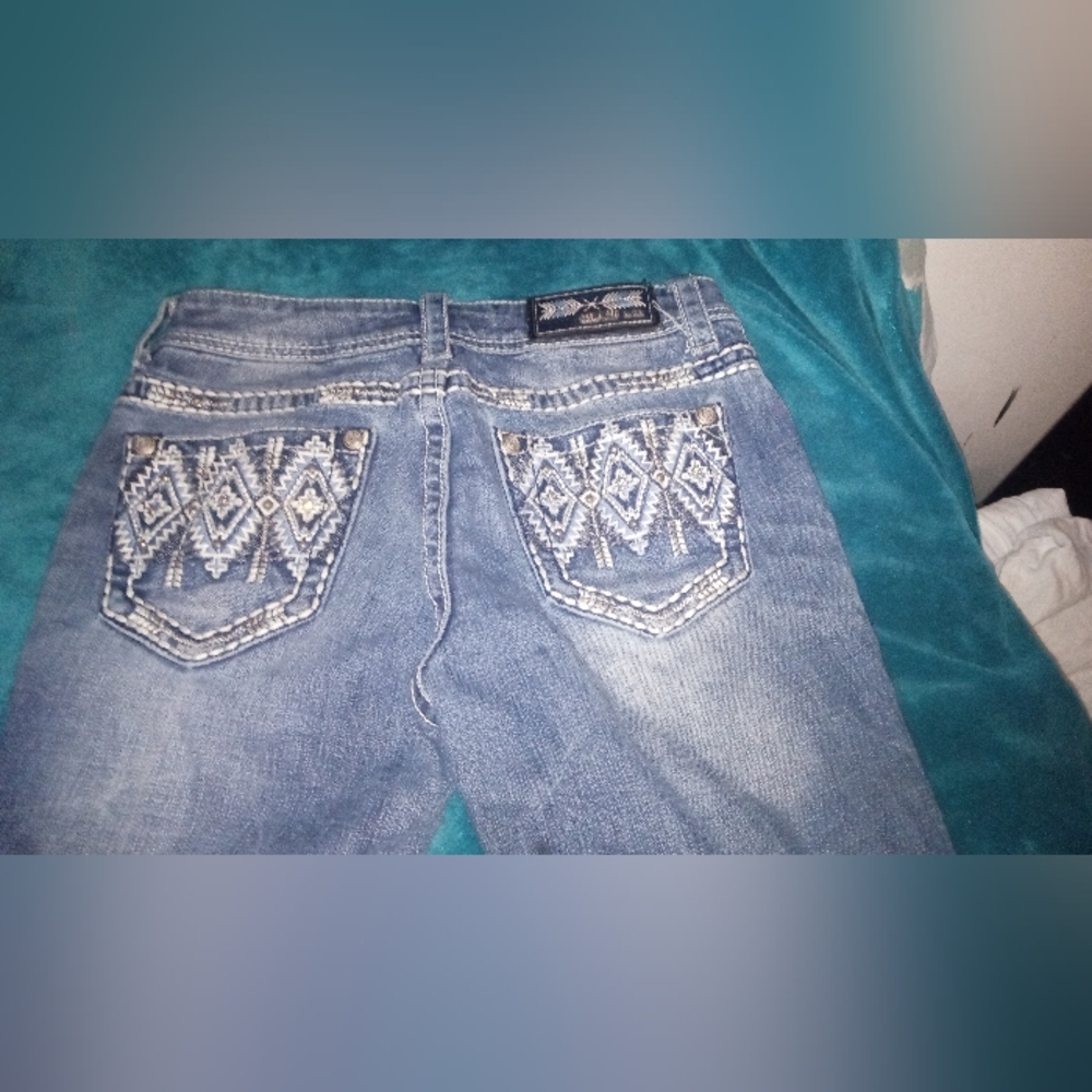 Women's Grace jeans boot cut very cute distressed and holy size 27